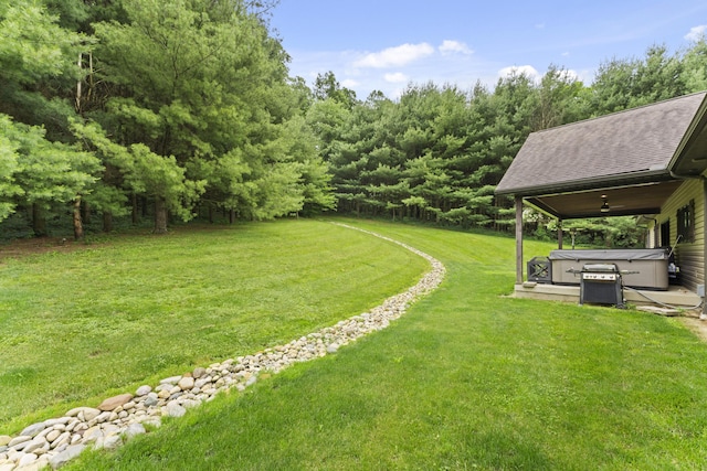 19694 State Route 60, Warsaw, OH 43844 - view of green lawn featuring a hot tub and ceiling fan