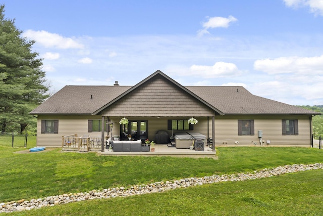 19694 State Route 60, Warsaw, OH 43844 - rear view of property featuring a hot tub, a patio area, a shingled roof, and a chimney