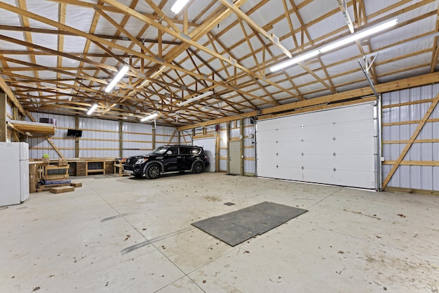 19694 State Route 60, Warsaw, OH 43844 - garage featuring freestanding refrigerator and metal wall