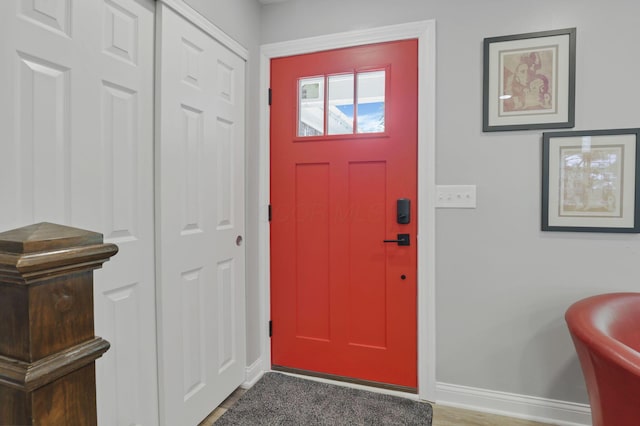 7881 Saddle, Powell, OH 43065 - foyer featuring baseboards and wood finished floors