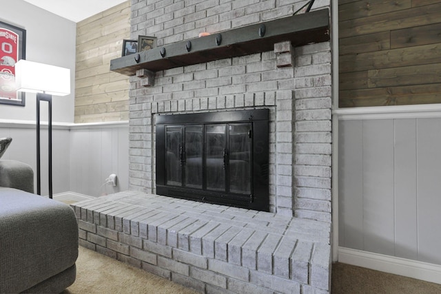 7881 Saddle, Powell, OH 43065 - detailed view of carpet, a fireplace, a wainscoted wall, a decorative wall, and wooden walls