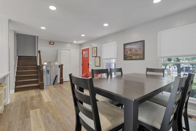 7881 Saddle, Powell, OH 43065 - dining space with recessed lighting, light wood-style floors, and stairs