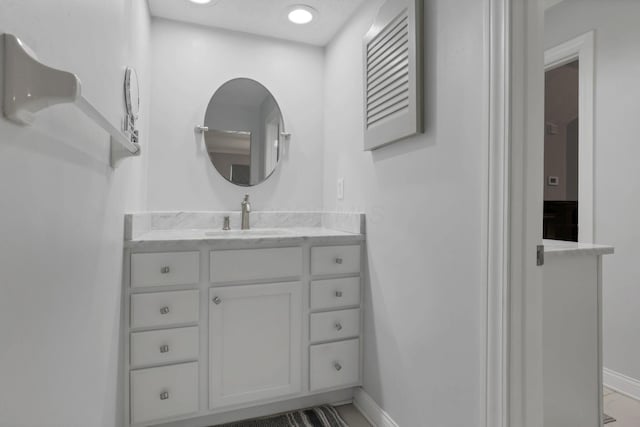 7881 Saddle, Powell, OH 43065 - bathroom with vanity and baseboards