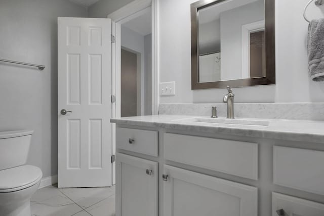 7881 Saddle, Powell, OH 43065 - bathroom with vanity and marble look tile flooring