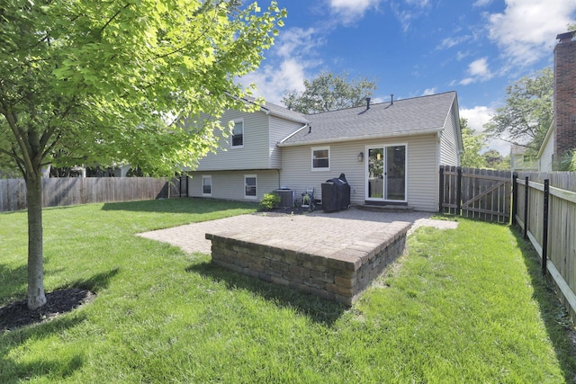 7881 Saddle, Powell, OH 43065 - back of house featuring a patio area, a fenced backyard, and roof with shingles