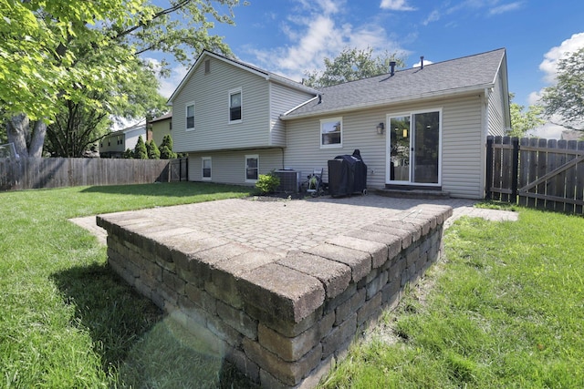 7881 Saddle, Powell, OH 43065 - back of property with a patio area, a fenced backyard, and roof with shingles