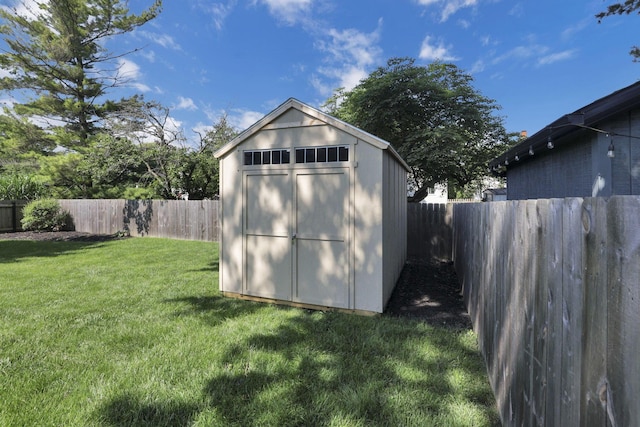 7881 Saddle, Powell, OH 43065 - view of shed featuring a fenced backyard