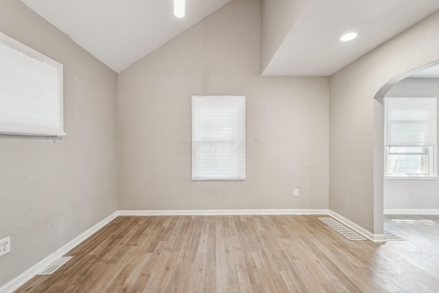 1328 Republic Ave, Columbus, OH 43211 - spare room with arched walkways and wood finished floors