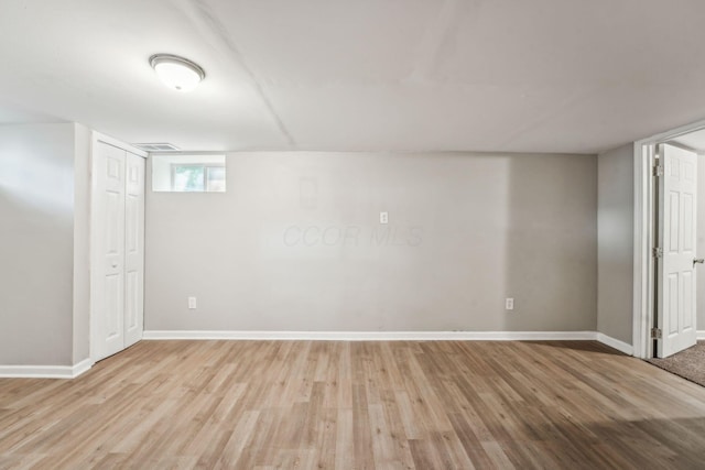 1328 Republic Ave, Columbus, OH 43211 - below grade area featuring wood finished floors and baseboards