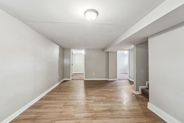 1328 Republic Ave, Columbus, OH 43211 - finished basement with light wood finished floors and stairway