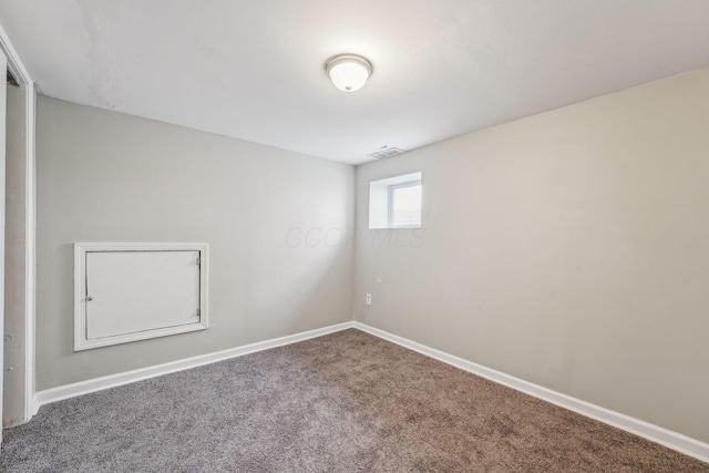 1328 Republic Ave, Columbus, OH 43211 - carpeted empty room with baseboards