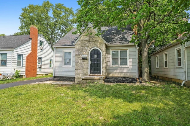 1328 Republic Ave, Columbus, OH 43211 - tudor-style house with a front lawn and a shingled roof