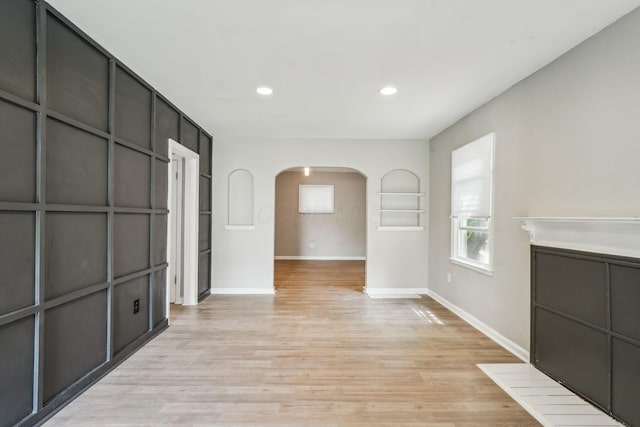 1328 Republic Ave, Columbus, OH 43211 - hall with arched walkways, built in features, light wood finished floors, and recessed lighting