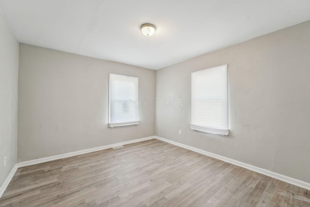 1328 Republic Ave, Columbus, OH 43211 - empty room featuring wood finished floors and baseboards