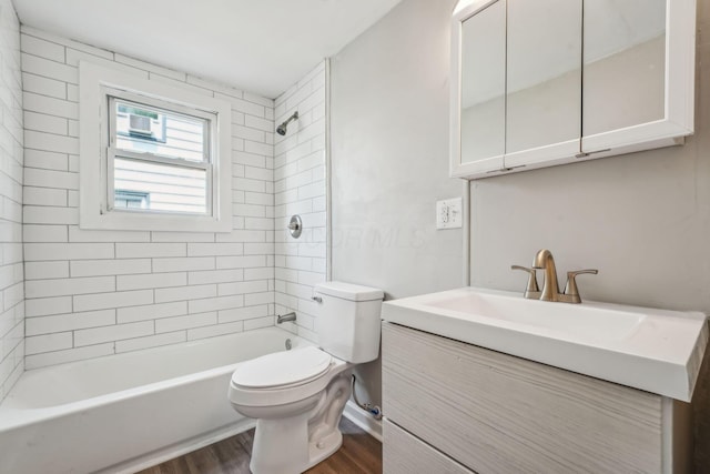 1328 Republic Ave, Columbus, OH 43211 - full bathroom featuring wood finished floors, vanity, and shower / washtub combination