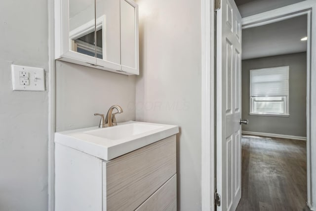 1328 Republic Ave, Columbus, OH 43211 - bathroom with vanity and wood finished floors