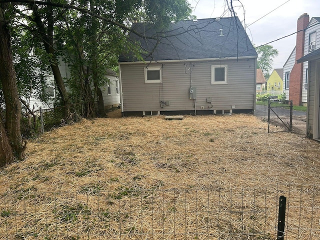 1328 Republic Ave, Columbus, OH 43211 - back of property with a gate and a shingled roof