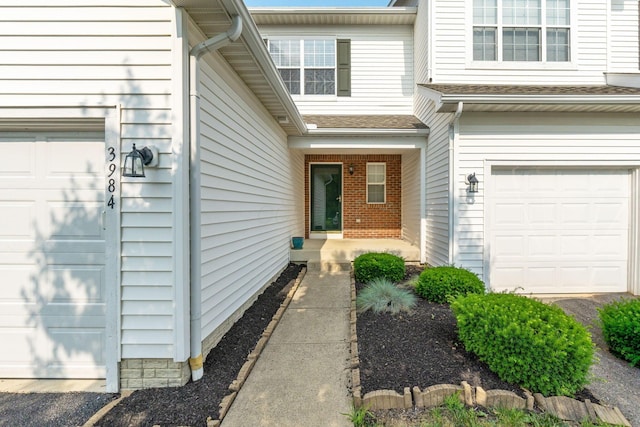 3984 Hill Park Rd, Hilliard, OH 43026 - property entrance featuring a garage and a porch