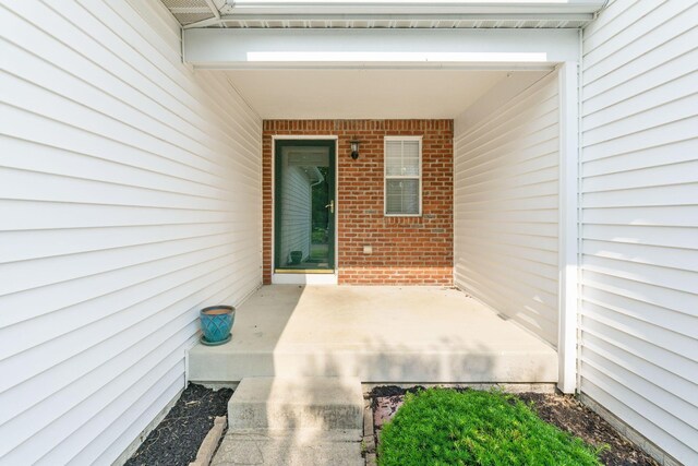 3984 Hill Park Rd, Hilliard, OH 43026 - view of exterior entry with brick siding