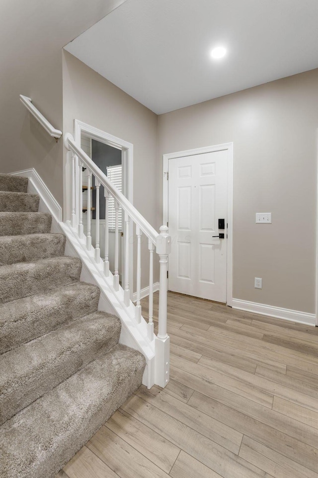 3984 Hill Park Rd, Hilliard, OH 43026 - entrance foyer with stairway and light wood finished floors