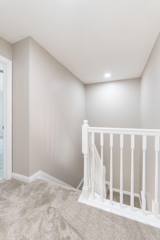 3984 Hill Park Rd, Hilliard, OH 43026 - corridor with carpet, an upstairs landing, and recessed lighting