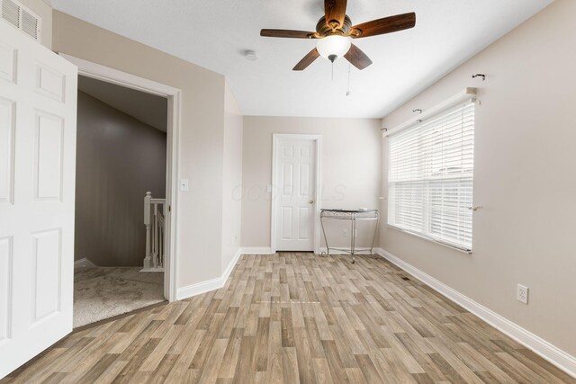 3984 Hill Park Rd, Hilliard, OH 43026 - unfurnished bedroom with light wood-style floors and ceiling fan