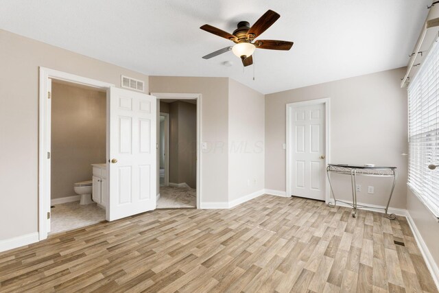 3984 Hill Park Rd, Hilliard, OH 43026 - unfurnished bedroom featuring light wood finished floors, ensuite bath, and a ceiling fan