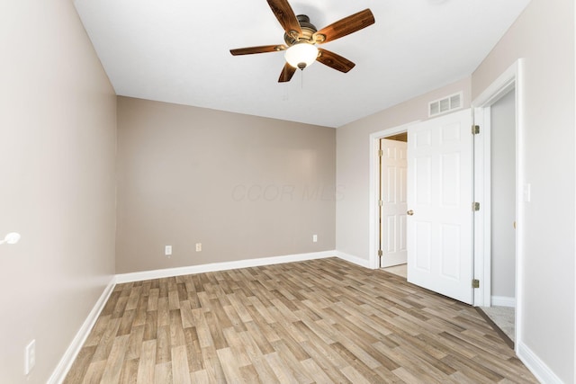 3984 Hill Park Rd, Hilliard, OH 43026 - unfurnished bedroom with light wood-style floors and ceiling fan