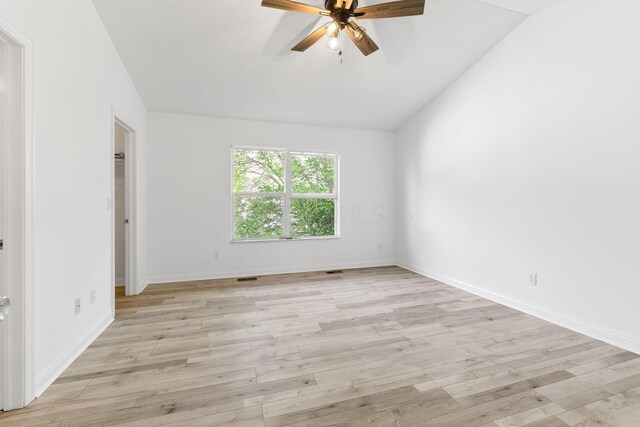 3984 Hill Park Rd, Hilliard, OH 43026 - unfurnished room featuring lofted ceiling, a ceiling fan, and light wood-style floors