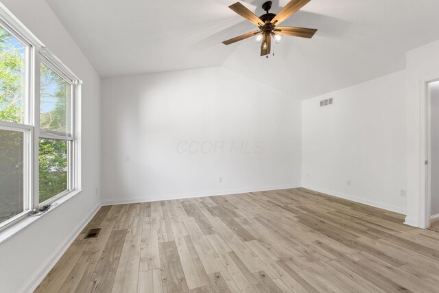 3984 Hill Park Rd, Hilliard, OH 43026 - empty room with plenty of natural light, light wood-type flooring, lofted ceiling, and ceiling fan