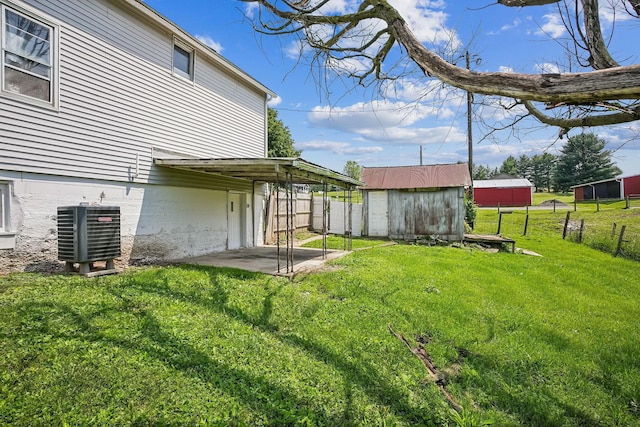 5505 Hopewell Church Rd SW, Lancaster, OH 43130 - view of yard with a storage unit and a patio