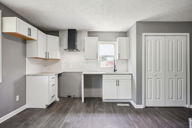 5505 Hopewell Church Rd SW, Lancaster, OH 43130 - kitchen featuring wall chimney exhaust hood, dark wood finished floors, backsplash, and a textured ceiling