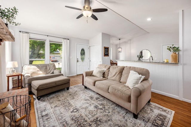 3776 Secretariat Ct, Columbus, OH 43221 - living room with vaulted ceiling, wood finished floors, and a ceiling fan