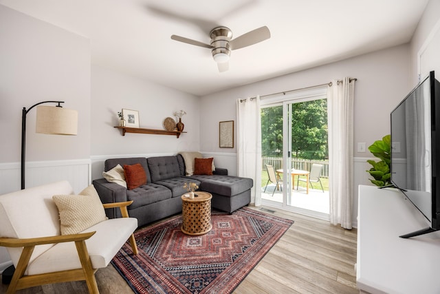 3776 Secretariat Ct, Columbus, OH 43221 - living area with light wood-style floors, wainscoting, and a ceiling fan