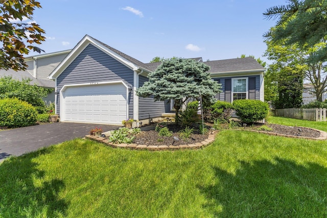 8544 Cadence Dr, Galloway, OH 43119 - view of front facade with a garage and driveway