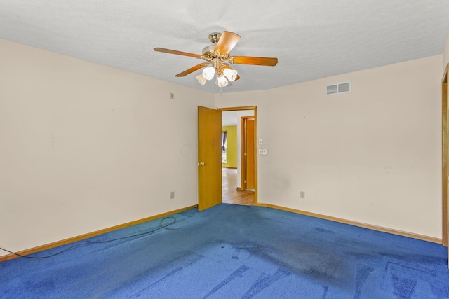 8544 Cadence Dr, Galloway, OH 43119 - carpeted empty room with a ceiling fan and a textured ceiling