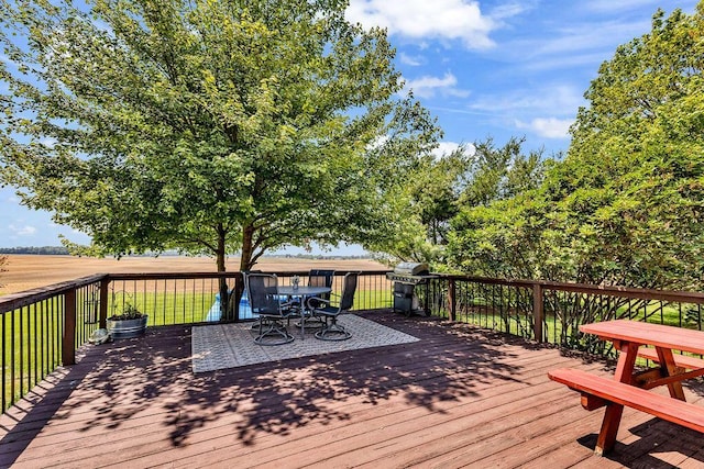 13283 Clover Valley Rd, Croton, OH 43013 - wooden deck featuring outdoor dining area and a grill