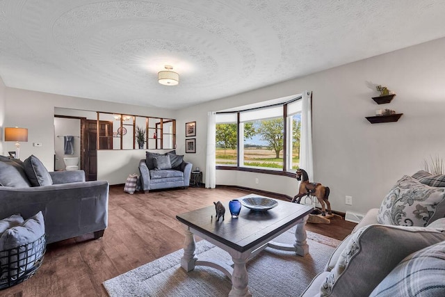 13283 Clover Valley Rd, Croton, OH 43013 - living room with a textured ceiling and wood finished floors