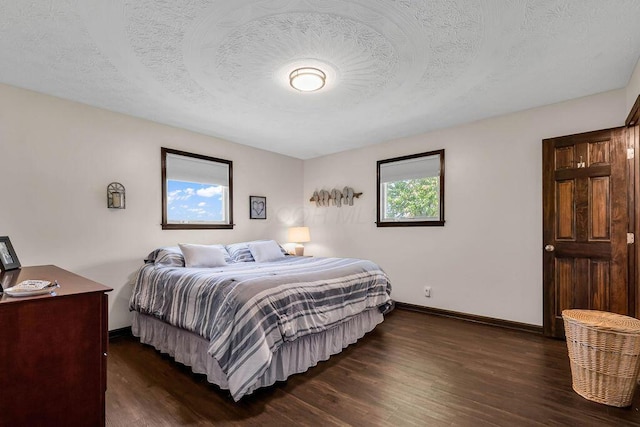 13283 Clover Valley Rd, Croton, OH 43013 - bedroom featuring dark wood finished floors and a textured ceiling
