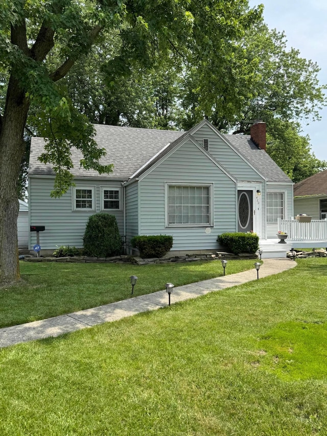 420 Forest Lawn Blvd, Marion, OH 43302 - ranch-style house with a front lawn, roof with shingles, and a chimney