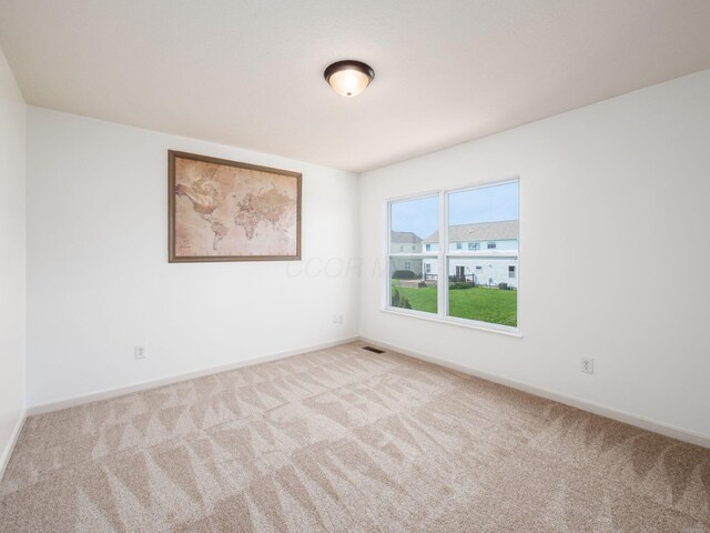 1719 Impatiens Way, Lewis Center, OH 43035 - spare room with carpet