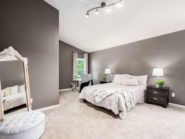1719 Impatiens Way, Lewis Center, OH 43035 - carpeted bedroom with vaulted ceiling and baseboards
