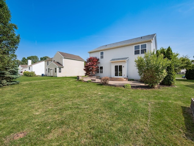 1719 Impatiens Way, Lewis Center, OH 43035 - rear view of house with a lawn