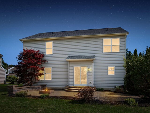 1719 Impatiens Way, Lewis Center, OH 43035 - back of property with a patio area and a fire pit