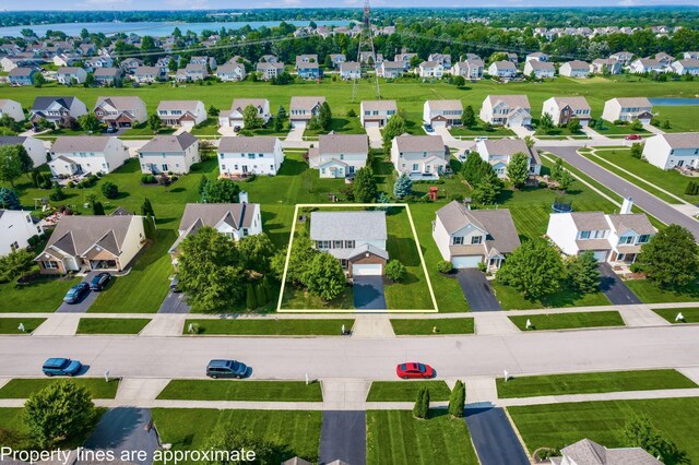 1719 Impatiens Way, Lewis Center, OH 43035 - aerial view of residential area with property boundaries highlighted and a large body of water