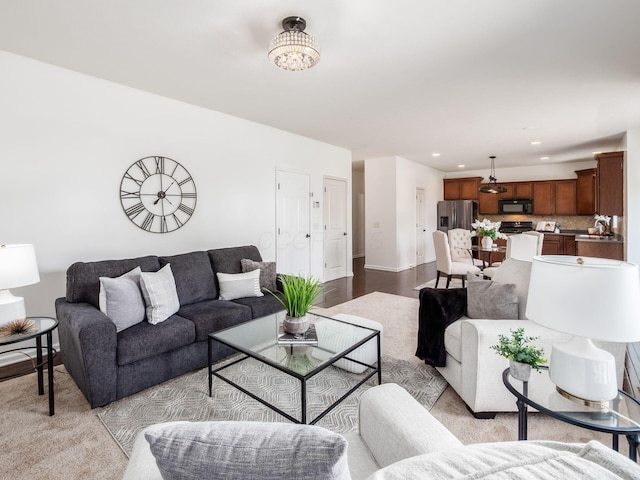 1719 Impatiens Way, Lewis Center, OH 43035 - living room with recessed lighting, a chandelier, and light carpet