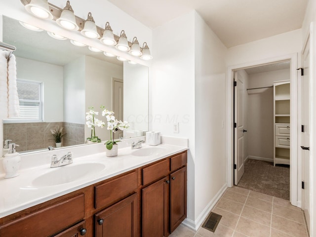 1719 Impatiens Way, Lewis Center, OH 43035 - bathroom featuring double vanity and tile patterned floors