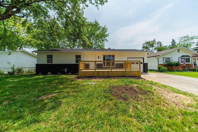 1874 Fleming Rd, Columbus, OH 43232 - ranch-style home featuring an attached garage, concrete driveway, a front yard, and stucco siding