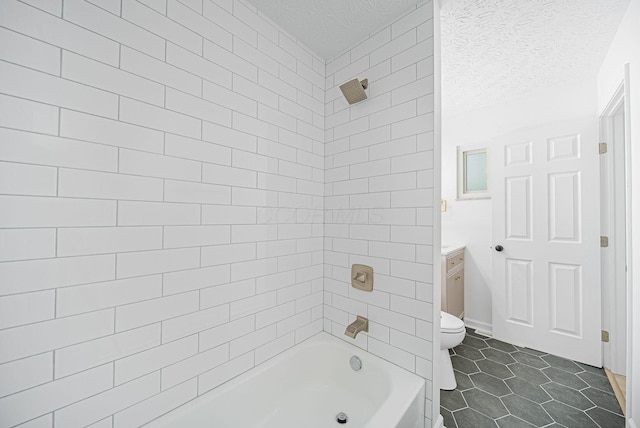 1874 Fleming Rd, Columbus, OH 43232 - bathroom with tile patterned floors, washtub / shower combination, vanity, and a textured ceiling