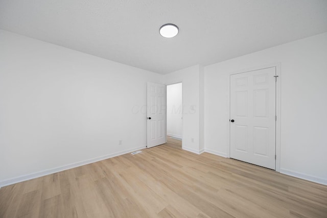 1874 Fleming Rd, Columbus, OH 43232 - unfurnished bedroom with light wood finished floors